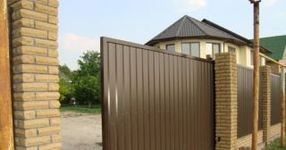 Купить откатные ворота из профнастила Белогорск, цена от 1766 руб.